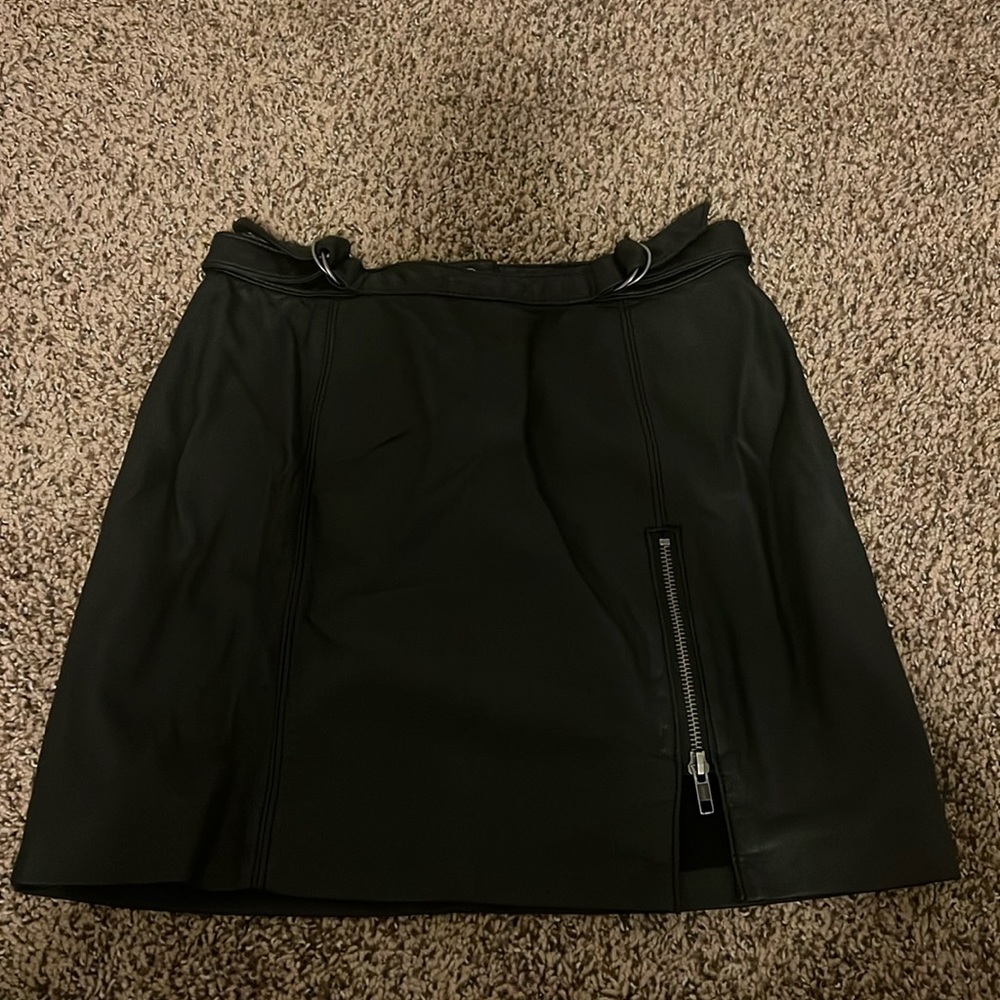 Free people leather skirt. Never worn but doesn’t have tags